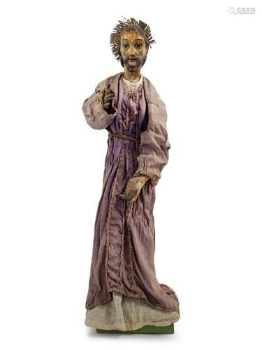 A Continental Painted Figure of a Saint