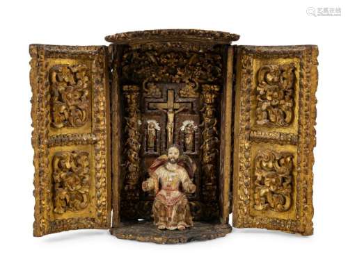 A Continental Giltwood Reliquary with a Figure of a