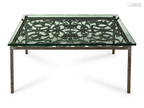 A Wrought Iron Grate Mounted as a Low Table