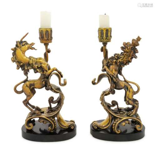 A Pair of Continental Bronze Figural Candlesticks