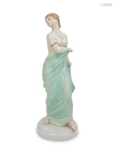 A Continental Porcelain Figure Height 15 3/4 inches.
