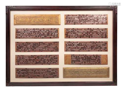 A Framed Collection of Indian Manuscript Leaves