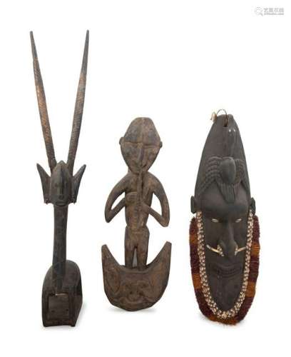 Ten African and New Guinea Masks and Carved Wood