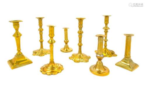 Eight English Brass Candlesticks