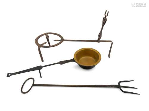 A Collection of Primitive Brass and Iron ToolsÂ