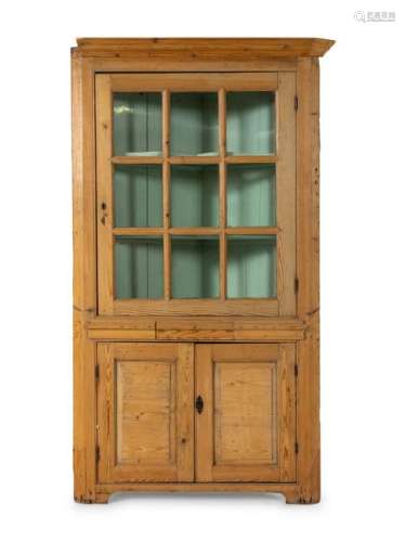 An American Pine Corner Cabinet Height 79 inches.