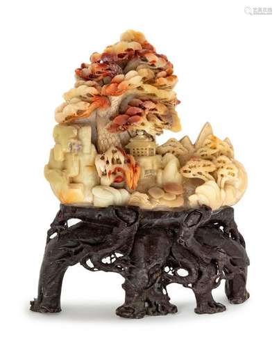 A Chinese Carved Soapstone Group Height 14 inches.