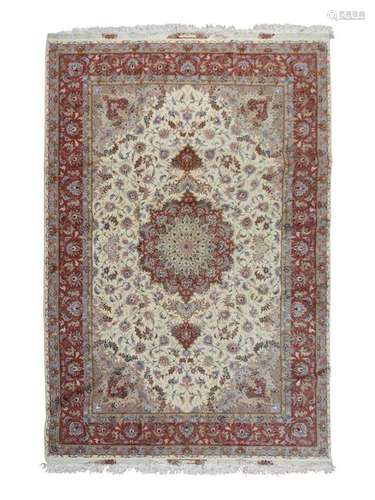 A Tabriz Silk and Wool Rug