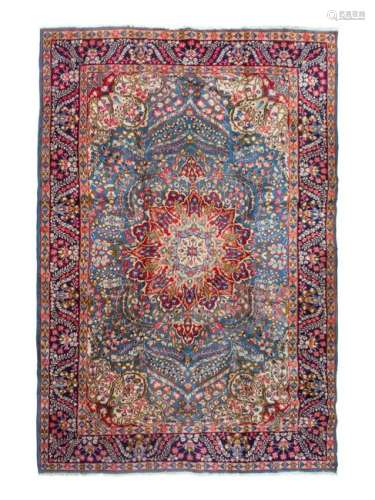 A Tabriz Wool Rug 9 feet 7 inches x 6 feet 8 inches.