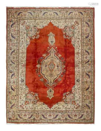 A Tabriz Wool Rug 12 feet 2 1/2 inches x 9 feet 9