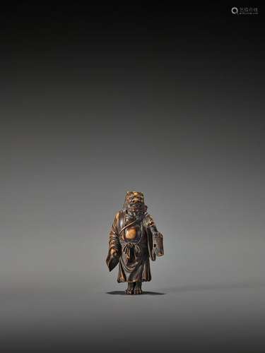 SHUSHO: A WOOD NETSUKE OF ONI NEMBUTSU