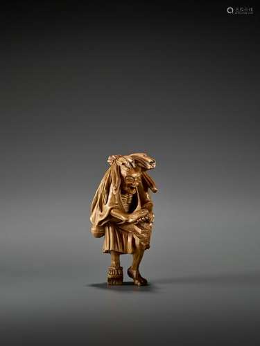 A LARGE WOOD NETSUKE OF THE OIL THIEF ABURA BOZU