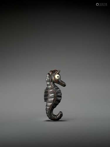 A VERY RARE DARK WOOD NETSUKE OF A SEA HORSE