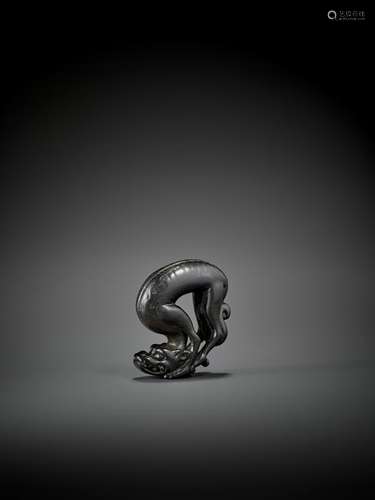 MASATOYO: IMPORTANT EBONY NETSUKE OF A KIRIN