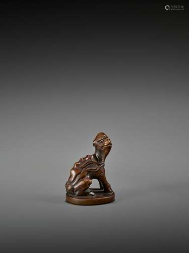 A RARE WOOD NETSUKE OF A SUISEI