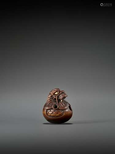 A RARE STAINED WOOD NETSUKE OF A DRAGON MOKUGYO