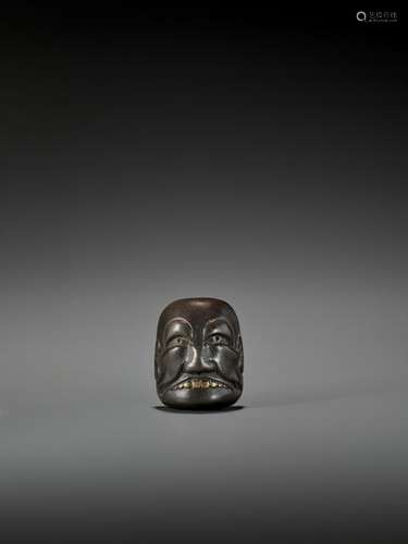 TSUYAMA: A LACQUERED WOOD MASK NETSUKE OF BUAKU