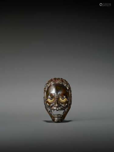 A RARE LACQUERED WOOD NETSUKE OF HANNYA