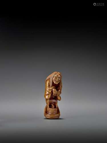 HIDEYUKI: WOOD NETSUKE OF A FEMALE GHOST