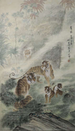 A CHINESE HAND-DRAWN PAINTING SCROLL OF TIGER FAMILY SIGNED BY 馮大中 ( 1949-   ) 晨風