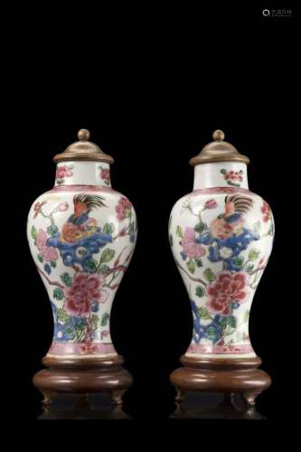 A pair of miniature garniture vases decorated with floral motifs, wood and base coversChina, 19th