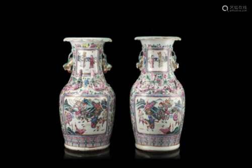 A pair of Cantonese Famille Rose vases decorated with figures in battle scenes (defects)China,