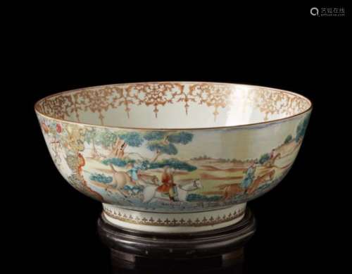 A Chinese export porcelain Famille Rose bowl decorated with a hunting scene wood base (defects and