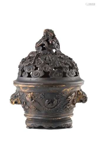 A bronze censer and cover, with twin lion-head handles, decorated with mythical creatures, the cover