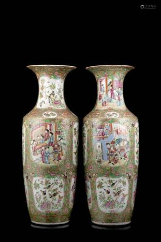 A pair of Cantonese Famille Rose vases decorated with figures and floral motifs (defects)China, half