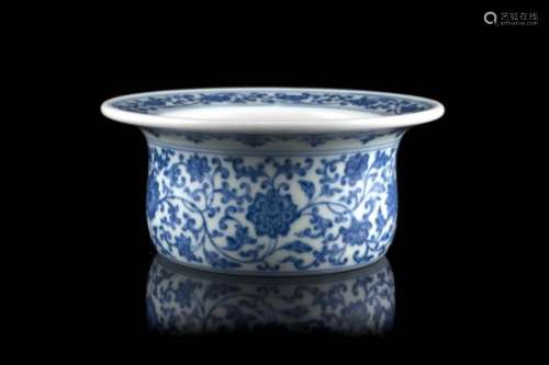 A blue and white bowl decorated with lotus flowers and scrolling leaves, apocryphal Qianlong mark to