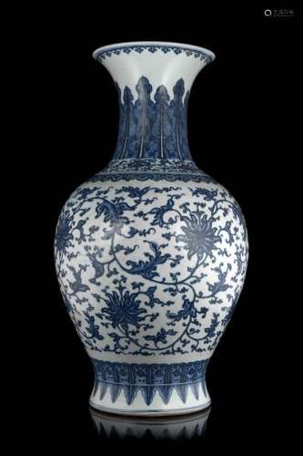 A large blue and white baluster vase decorated with stylised lotus flowers and scrolling leaves