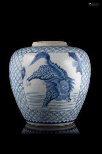A blue and white porcelain jar decorated with panels depicting mythical creaturesChina, 19th