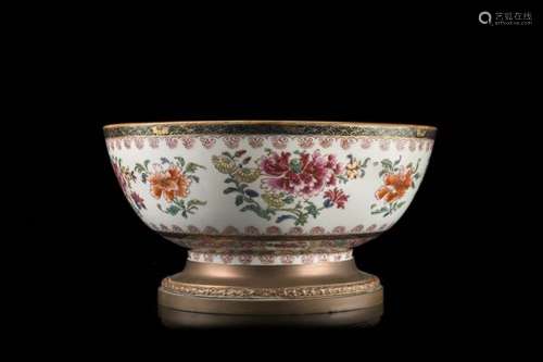 A Famille Rose bowl decorated with floral motifs, with bronze mounts (slight defects)China, 19th