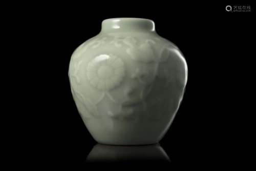 A small celadon-glazed porcelain vase decorated in relief with flowering branches, Daoguang seal
