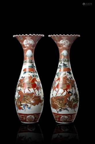 A pair of trumpet-necked lobed vases decorated with a battle scene in polychrome enamels (defects)