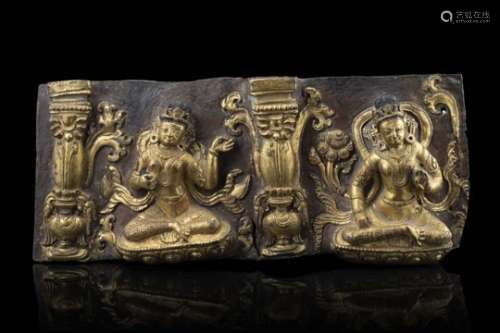 A gilt bronze section of the lower part of a stupa, decorated with figures in repoussÃ¨ technique (
