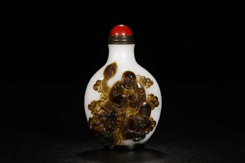 PEKING GLASS SNUFF BOTTLE WITH ARHATS RELIEF