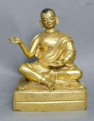 EARLY MING GILT BRONZE STATUE OF GURU BUDDHA