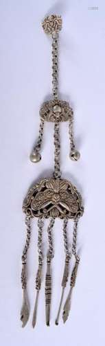 A CHINESE WHITE METAL CHATELAINE. 30 cm long.