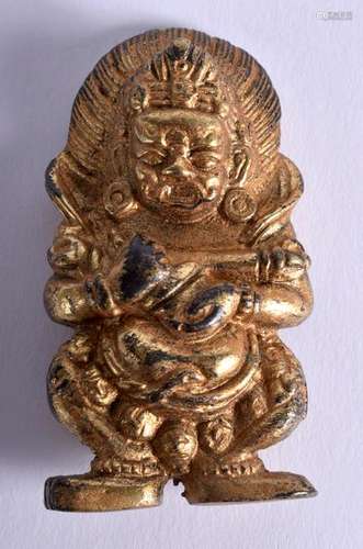 A TIBETAN BRONZE BUDDHA. 5.5 cm x 3 cm.