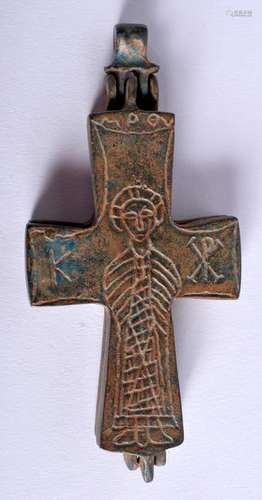 A CENTRAL ASIAN BRONZE CRUCIFIX PENDANT. 9 cm x 4.5 cm.