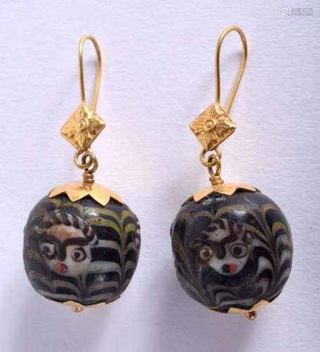 A PAIR OF 18CT GOLD GLASS CONTINENTAL EARRINGS.