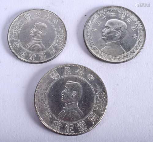 THREE CHINESE COINS. 55.5 grams. (3)