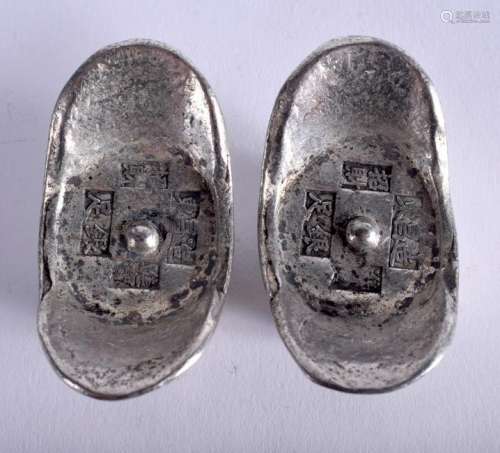 TWO CHINESE WHITE METAL INGOTS. 193.8 grams. (2)