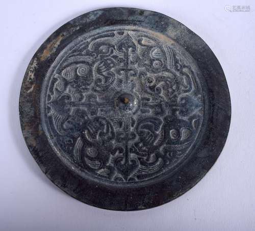 A CHINESE BRONZE HAND MIRROR. 13 cm wide.