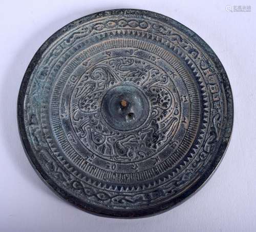 A CHINESE BRONZE HAND MIRROR. 13 cm wide.