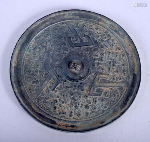 A CHINESE BRONZE HAND MIRROR. 13 cm wide.