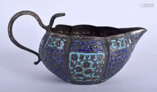 AN ANTIQUE INDIAN ENAMELLED SILVER JUG. 113 grams. 12