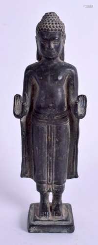 AN EARLY 20TH CENTURY CAMBODIAN KHMER BRONZE FIGURE OF