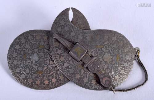 AN ISLAMIC MIDDLE EASTERN WHITE METAL BUCKLE. 9 cm